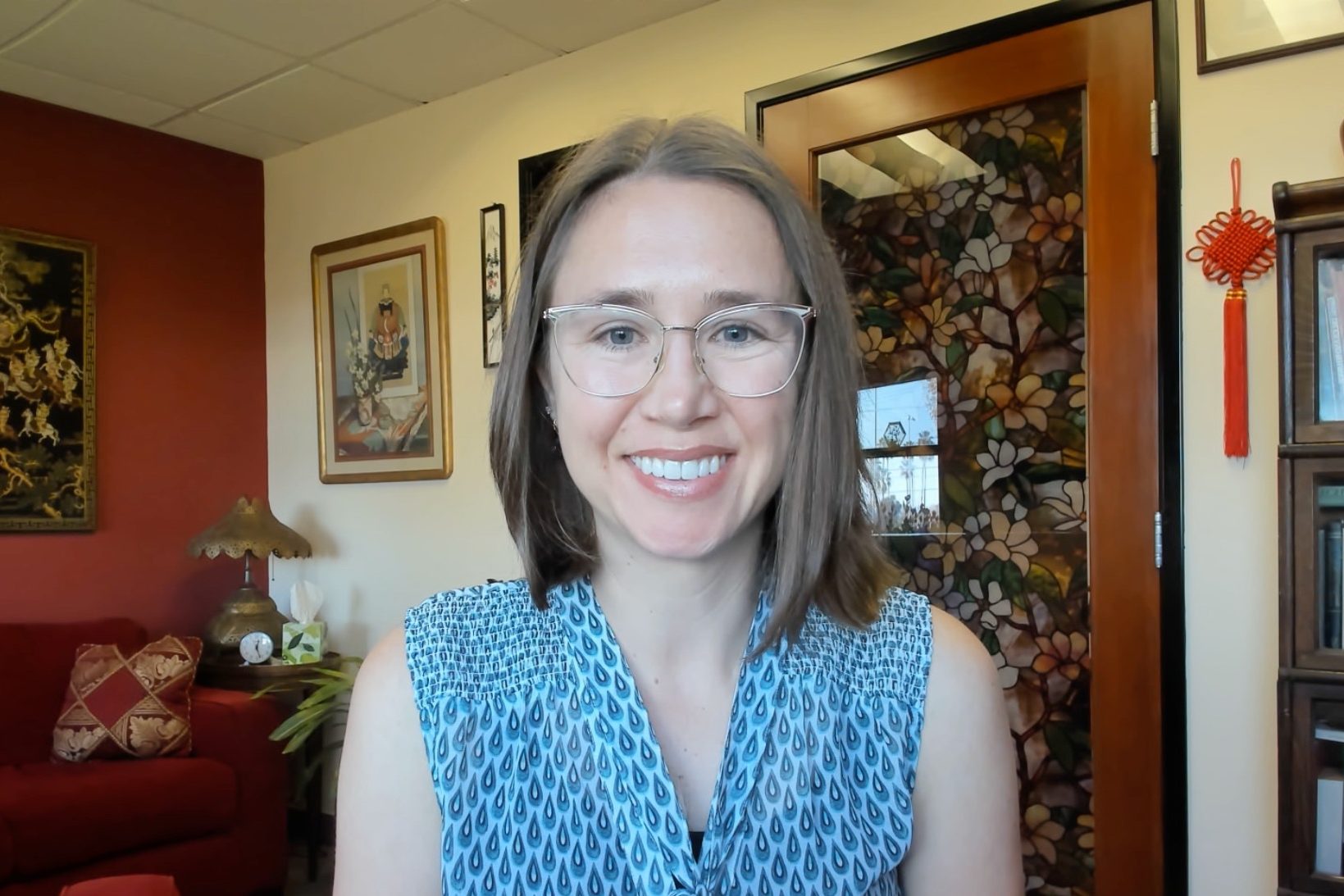 Picture of Kristen Hornung, a white woman with shoulder length hair